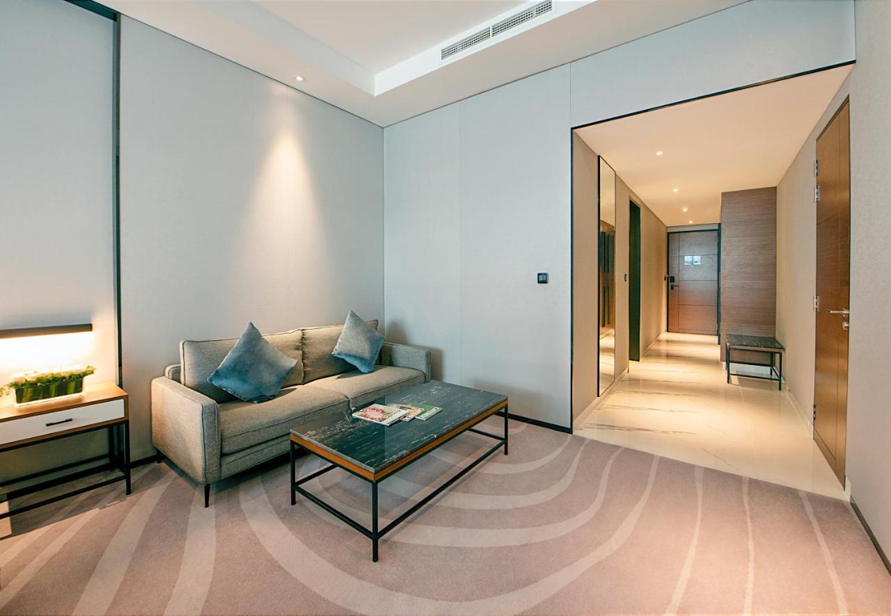 Asiana Grand Hotel Dubai Exterior foto A room at the hotel