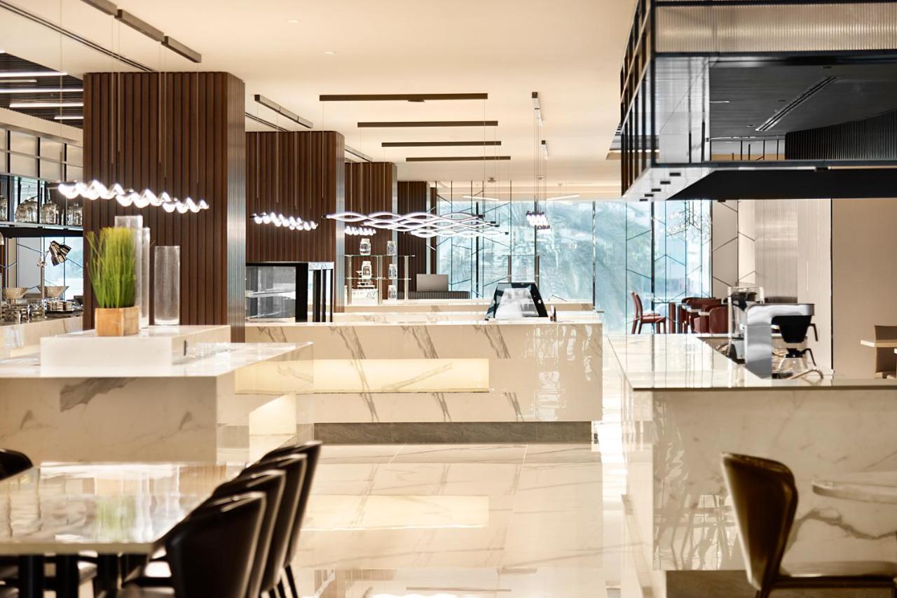 Asiana Grand Hotel Dubai Exterior foto The lounge at the airport
